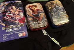 Bandai One Piece CCG The Azure Sea's Seven Booster Pack and One Piece Tins - Image 1