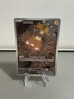 Stunfisk Illustration Rare SV08: Surging Sparks 202/191 NM - Pokemon TCG - Image 1