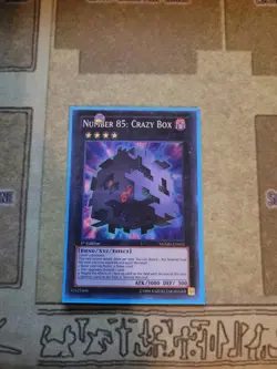 YUGIOH TCG NUMBER 85: CRAZY BOX NUMH-EN033 SUPER 1ST EDITION NM - Image 1