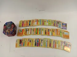 Pokemon TCG Mixed Card Bundle With Collector Tin - Image 1