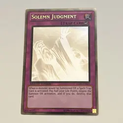 Solemn Judgment GLD5-EN045 *LP* Limited Edition Ghost Gold Rare Yugioh Card - Image 1