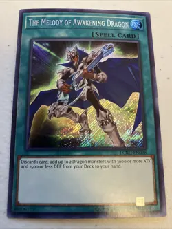 The Melody Of Awakening Dragon MISPRINT Stamp LCKC-EN028 Secret Rare Yu-Gi-Oh! - Image 1