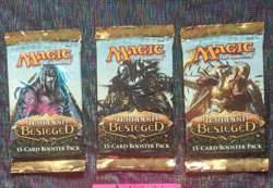 mtg 3X Mirrodin Besieged booster packs - Image 1