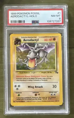 1999 POKEMON FOSSIL #1 AERODACTYL-HOLO PSA 8 - Image 1
