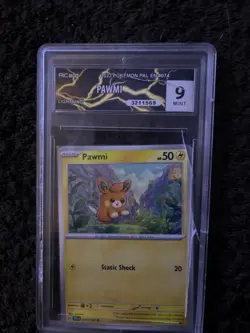Pokemon Pawmi TCG Sv02 Paldea Evolved Card 074/193 Near Mint Cosmo Holo - Image 2