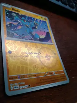 Riolu 050/131 Sv: Prismatic Evolutions Reverse Holo pokemon card - Image 2