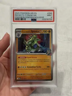 2025 POKEMON DESTINED RIVALS POKEMON CENTER #096 TEAM ROCKET'S TYRANITAR PSA 9 - Image 1