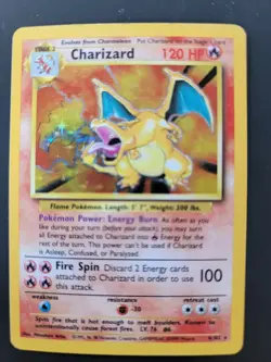 1999 POKEMON BASE SET #4 CHARIZARD-HOLO - Image 1