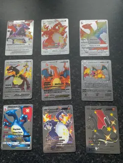 Pokemon Trading Cards loose Silver Novelty charizard cards. - Image 1
