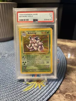 1999 Pokemon TCG Base Set Nidoking 11 PSA 5 - Image 1