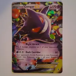 Gengar EX Pokemon trading card from the XY—Phantom Forces expansion - Image 1