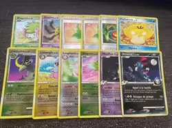 LOT 12 CARTES POKEMON HOLOS/REVERSES PLATINE DE BASE OCCASION - Image 1