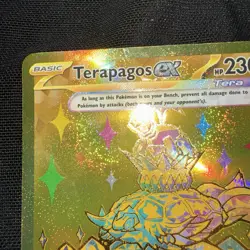 Pokemon TCG Terapagos ex 180/131 Gold Secret Rare Prismatic Evolutions - Image 1