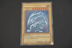 Carte YuGiOh Dragon blanc aux yeux bleus 1ere Edition DDK-C001 - HP/DAMAGED - FR - Image 1