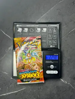 (VERY HEAVY)🔥 22.48g Pokemon Surging Sparks Booster Pack Sealed- Possible SIRU - Image 1