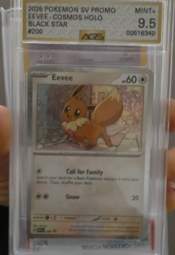 Pokemon Eevee SVP200 Scarlet & Violet Promo Cosmos Holo Black Star AGS 9.5 - Image 1