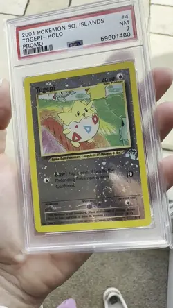 Pokemon Southern Islands Promo #4 Togepi Reverse Holo PSA 7 - Image 2