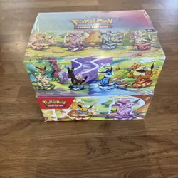 Pokemon TCG Prismatic Evolutions Mini Tin Display Case | 8 Tins - Sealed - Image 1