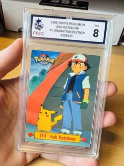 ASH KETCHUM 1999 TOPPS POKEMON TV ANIMATION EDITION S1 BLUE LOGO #TV1 MGC 8 - Image 1