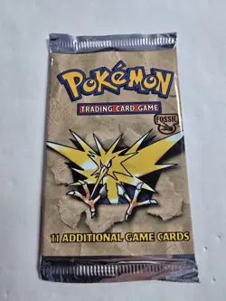 1999 Pokemon Fossil Unlimited Booster Pack Zapdos Artwork Factory Sealed 20.56g - Image 1