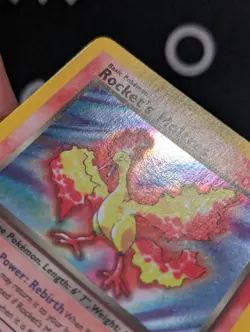 Rocket's Moltres 012/132 Gym Heroes Pokemon NM Unlimited Holo Swirl - Image 2