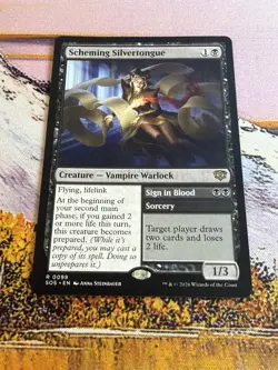 Scheming Silvertongue - Secrets of Strixhaven - SOS R 0099 - Image 1