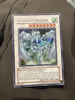 Stardust Dragon TDGS-EN040 Ghost Rare 1st Edition Yu-Gi-Oh - Image 1