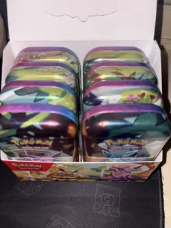 Pokemon Prismatic Evolutions Mini Tins Opened No Packs Full Set Of 8 with coins - Image 1