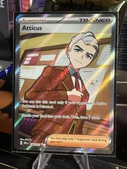 Pokemon Atticus Trainer Card 134/131 Ultra Rare Full Art Prismatic Evolutions - Image 1