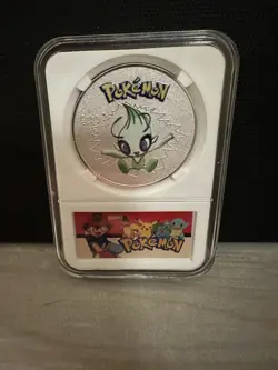Pokemon Embossed Metal Coin Celebi Collectible - Image 1