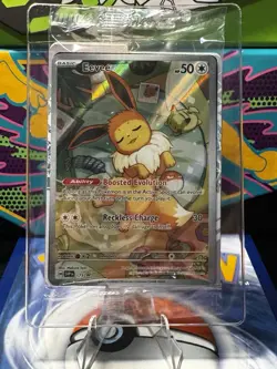 Pokemon Prismatic Evolutions - Eevee SVPEN 173 Black Star Promo - SEALED - Image 1