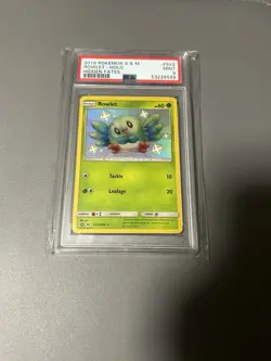 Pokemon PSA 9 Rowlet SV2/SV94 Hidden Fates Holofoil 2019 - Image 1