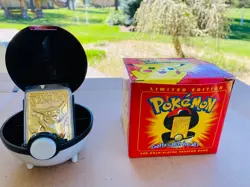 1999 Pokemon 23K Gold-Plated Pikachu Trading Card with Authentic Pokeball - Image 1
