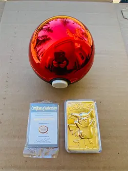 1999 Pokemon 23K Gold-Plated Pikachu Trading Card with Authentic Pokeball - Image 3