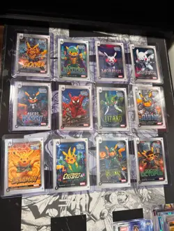 12 card lot. Pokemon Pikachu Heroes & Villans, spidey villans, bubble holo - Image 1