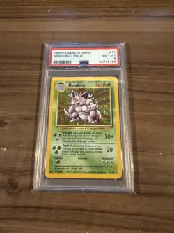 1999 POKEMON BASE SET UNLIMITED #11 NIDOKING-HOLO PSA 8 - Image 1