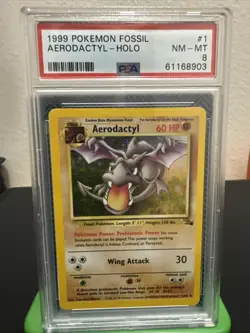 1999 POKEMON FOSSIL #1 AERODACTYL-HOLO PSA 8 - Image 1