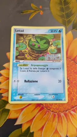 Lotad Holo Logo 55/100 Guardiani dei Cristalli Pokemon TCG ITA - Image 1