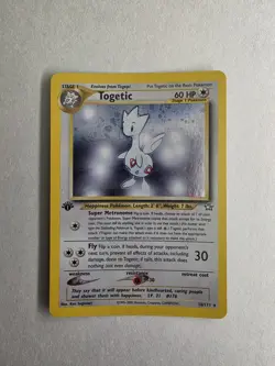 Togetic 1st Edition holo card from the Pokemon Neo Genesis set - Image 1