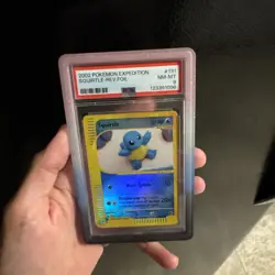 2002 POKEMON EXPEDITION #131 SQUIRTLE-REVERSE FOIL PSA 8 - Image 1