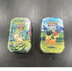 Pokemon TCG Collectible Tin Featuring Pikachu & Leafeon - Standard Card Size - Image 1