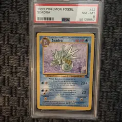 1999 POKEMON FOSSIL #42 SEADRA 1ST EDITION PSA 8 NM-MT - Image 1