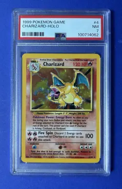1999 Pokemon Game Charizard Holo #4 PSA 7 NM - Image 1