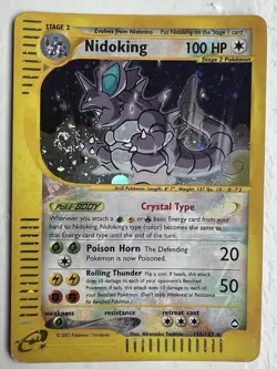 Nidoking Crystal Type 150/147 Aquapolis Secret Rare Pokemon Card WOTC Swirl - Image 1
