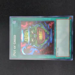 Yugioh LCJW-EN061 Pot of Greed Secret Rare 1st Edition NM - Image 1