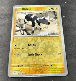 Pokemon Surging Sparks Blitzle Reverse Holo Common Card 062/191 NM - Image 1