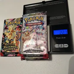 Pokemon Prismatic Evolutions Heavy Pack + Ascended Heroes Heavy - Sealed - Image 1