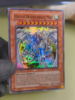 Stardust Dragon/Assault Mode DP09-EN001 Super rare 1st Edition LP - Image 1
