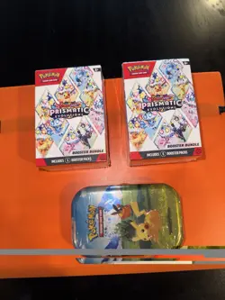 Pokemon Prismatic Evolutions Booster Bundle Boxes & Pikachu Tin - 2 Box Set - Image 1