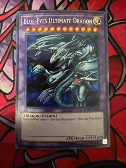 Blue-Eyes Ultimate Dragon LCKC-EN057 Secret Rare LP-NM Unlimited Edition - Image 1